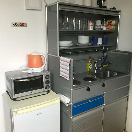 Apartmenthaus Zentrum Komfort Mit Miniküchen Verschiedener Größen Apartment